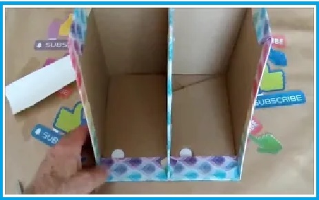 Come fare un contenitore per libri da una scatola di cartone